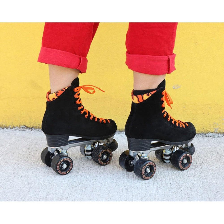 Chuffed Skates black roller skates  with yellow background