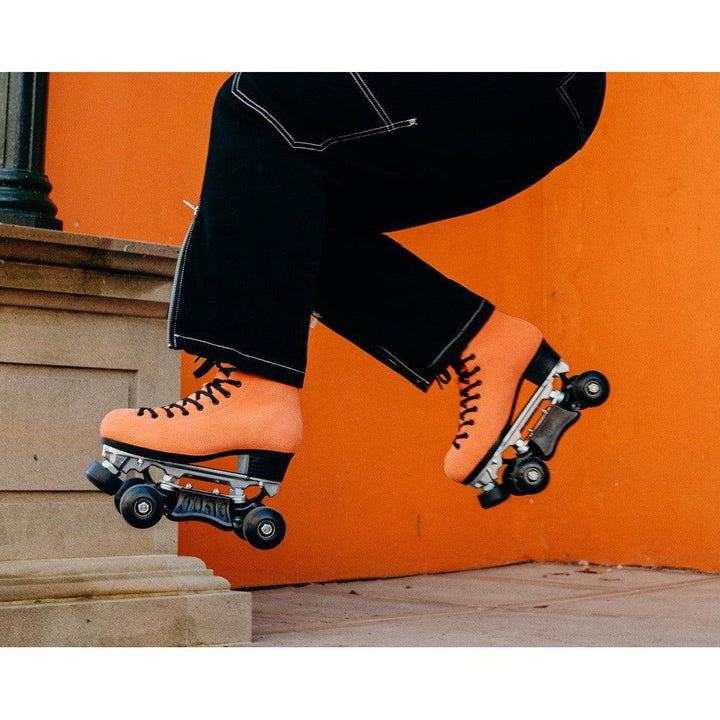 Orange Pro Boot rollerskate, jumping on skates